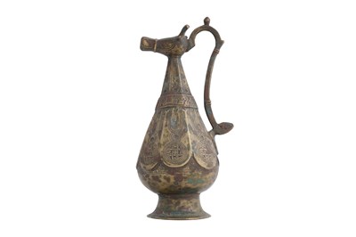 Lot 42 - A SELJUK KHURASAN BRONZE EWER WITH ZOOMORPHIC BULLS HEAD SPOUT