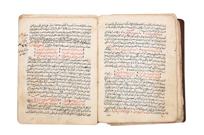 Lot 192 - TWO MANUSCRIPTS: A QURANIC COMMENTARY (TAFSIR) AND A MANUSCRIPT ON ISLAMIC LAWS