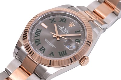 A MEN'S ROLEX STAINLESS STEEL AND 18K ROSE GOLD AUTOMATIC BRACELET WATCH WITH A WIMBLEDON DIAL.