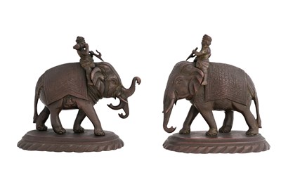 Lot 83 - TWO ANGLO-INDIAN COPPER-ALLOY FIGURES ON ELEPHANTS FROM THE SAME SET