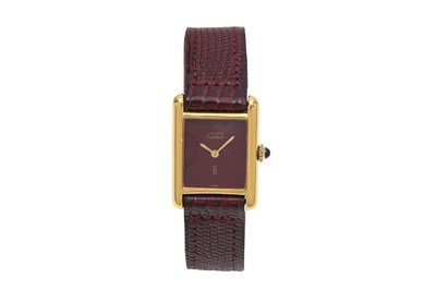Lot 2 - A RARE LADIES' MUST DE CARTIER ARGENT GOLD-PLATED WRISTWATCH WITH A BURGUNDY DIAL.