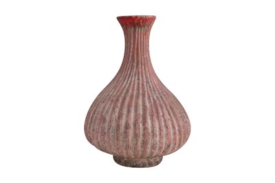 Lot 6 - A SAFAVID-STYLE RIDGED TERRACOTTA FLASK