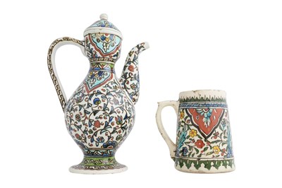Lot 35 - KÜTAHYA POTTERY LIDDED JUG AND TANKARD