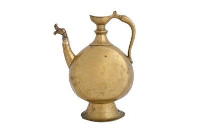 Lot 79 - AN INDIAN BRASS EWER