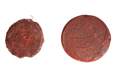 Lot 167 - TWO MUGHAL ROUND WAX SEALS WITH CALLIGRAPHIC INSCRIPTIONS