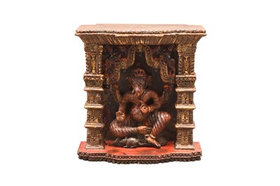 Lot 63 - THREE LARGE POLYCHROME-PAINTED CARVED WOODEN PANELS WITH NINE HINDU GODDESSES AND GANESHA