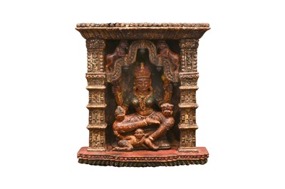 Lot 63 - THREE LARGE POLYCHROME-PAINTED CARVED WOODEN PANELS WITH NINE HINDU GODDESSES AND GANESHA