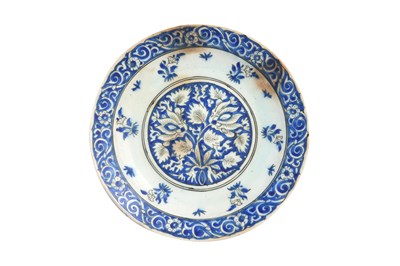 Lot 7 - A SAFAVID BLUE AND WHITE POTTERY DISH