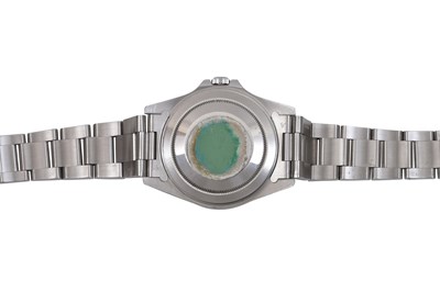 A ROLEX MEN’S STAINLESS STEEL GMT FUNCTION AUTOMATIC BRACELET WATCH.