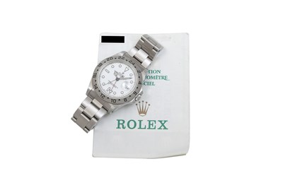 A ROLEX MEN’S STAINLESS STEEL GMT FUNCTION AUTOMATIC BRACELET WATCH.