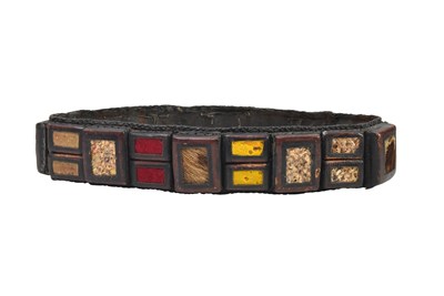 Lot 409 - A CEREMONIAL SUB-SAHARAN LEATHER HEADDRESS WITH HORSE AND BUFFALO HAIR, AND SNAKESKIN