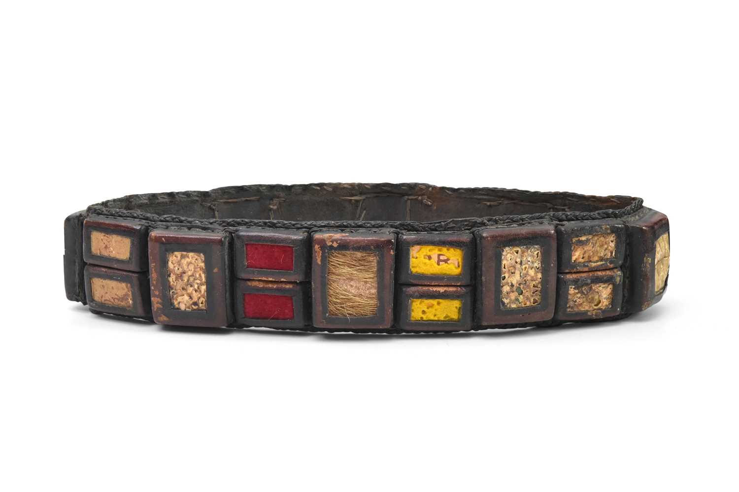 Lot 409 - A CEREMONIAL SUB-SAHARAN LEATHER HEADDRESS WITH HORSE AND BUFFALO HAIR, AND SNAKESKIN