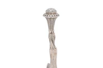 Lot 321 - A STORK-SHAPED INDIAN PARCEL-GILT SILVER ROSEWATER SPRINKLER (GULABPASH)