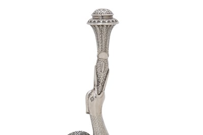 Lot 321 - A STORK-SHAPED INDIAN PARCEL-GILT SILVER ROSEWATER SPRINKLER (GULABPASH)