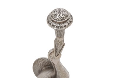 Lot 321 - A STORK-SHAPED INDIAN PARCEL-GILT SILVER ROSEWATER SPRINKLER (GULABPASH)