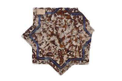 Lot 151 - TWO ILKHANID-REVIVAL COPPER LUSTRE-PAINTED STAR-SHAPED POTTERY TILES