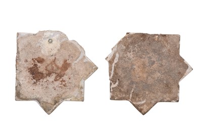 Lot 151 - TWO ILKHANID-REVIVAL COPPER LUSTRE-PAINTED STAR-SHAPED POTTERY TILES