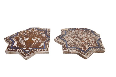 Lot 151 - TWO ILKHANID-REVIVAL COPPER LUSTRE-PAINTED STAR-SHAPED POTTERY TILES