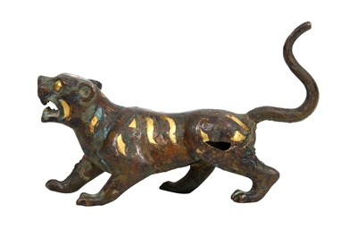 Lot 4 - A CHINESE PARCEL-GILT BRONZE FIGURE OF A TIGER