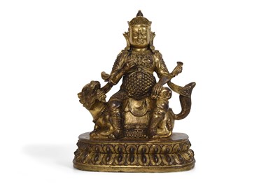 Lot 46 - A GILT LACQUERED BRONZE FIGURE OF LOKAPALA