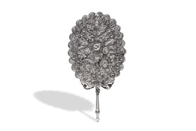 Lot 188 - AN OTTOMAN REPOUSSÉ SILVER MIRROR WITH FLORAL BOUQUET AND CORNUCOPIA