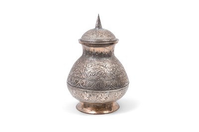 Lot 103 - AN ENGRAVED AND CHASED MALAY SILVER CEREMONIAL WATER JUG