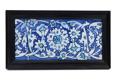 Lot 165 - AN OTTOMAN BLUE AND WHITE IZNIK POTTERY BORDER TILE