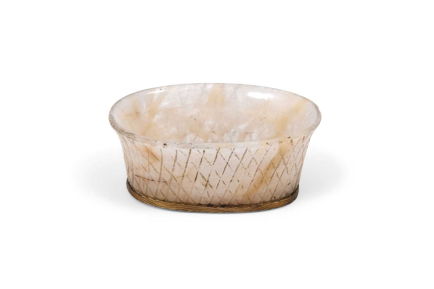 Lot 84 - A CARVED ROCK CRYSTAL INKWELL