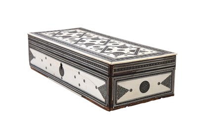 Lot 66 - λ AN IVORY-INLAID CARVED SANDALWOOD SADELI-WARE LIDDED BOX