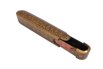 Lot 137 - A QAJAR LACQUERED PAPIER-MÂCHÉ PEN CASE (QALAMDAN) WITH LOTUS SCROLLS