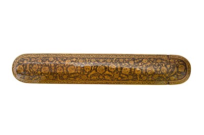 Lot 137 - A QAJAR LACQUERED PAPIER-MÂCHÉ PEN CASE (QALAMDAN) WITH LOTUS SCROLLS
