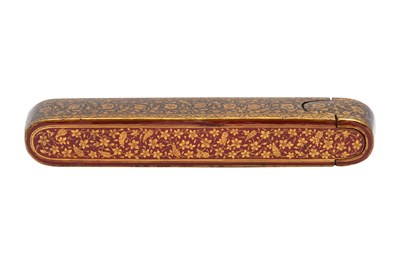 Lot 137 - A QAJAR LACQUERED PAPIER-MÂCHÉ PEN CASE (QALAMDAN) WITH LOTUS SCROLLS