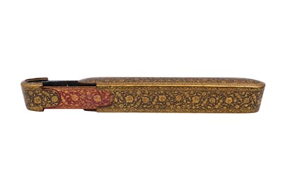 Lot 137 - A QAJAR LACQUERED PAPIER-MÂCHÉ PEN CASE (QALAMDAN) WITH LOTUS SCROLLS