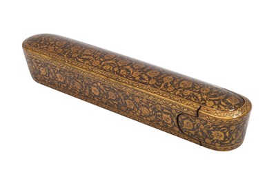 Lot 137 - A QAJAR LACQUERED PAPIER-MÂCHÉ PEN CASE (QALAMDAN) WITH LOTUS SCROLLS