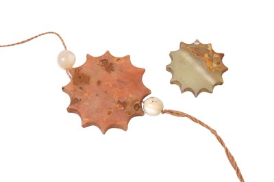 Lot 214 - A SUFI BEKTASHI ORDER HONORIFIC BELT AND CARVED AGATE TWELVE-POINTED STAR AMULETS