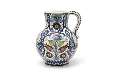 Lot 177 - AN OTTOMAN DAMASCUS-STYLE CANTAGALLI POTTERY JUG WITH TULIPS AND ROSES