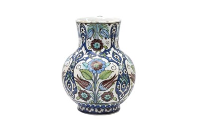 Lot 177 - AN OTTOMAN DAMASCUS-STYLE CANTAGALLI POTTERY JUG WITH TULIPS AND ROSES