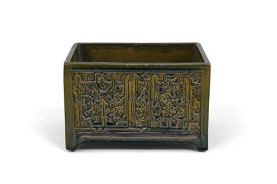 Lot 229 - AN HISPANO-MORESQUE ALHAMBRA-STYLE GREEN-GLAZED MOULDED POTTERY CONTAINER