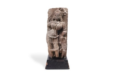 Lot 82 - AN INDIAN CARVED RED SANDSTONE FEMALE BUST