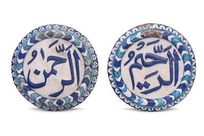 Lot 146 - TWO MOULDED CALLIGRAPHIC MULTAN POTTERY ROUNDELS WITH PART OF THE BISMILLAH