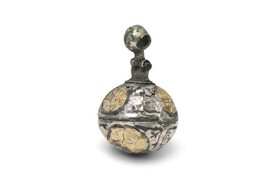 Lot 104 - A MEDIEVAL NIELLO AND PARCEL-GILT SILVER PENDANT WITH GRIFFINS