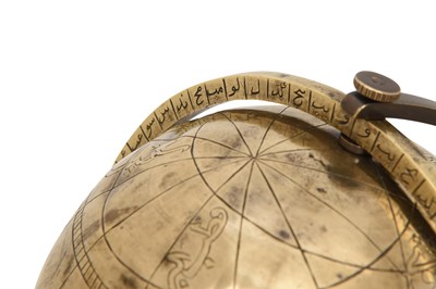 Lot 141 - AN ENGRAVED BRASS CELESTIAL GLOBE WITH ARABIC INSCRIPTIONS