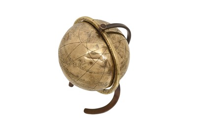 Lot 141 - AN ENGRAVED BRASS CELESTIAL GLOBE WITH ARABIC INSCRIPTIONS