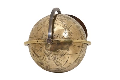 Lot 141 - AN ENGRAVED BRASS CELESTIAL GLOBE WITH ARABIC INSCRIPTIONS