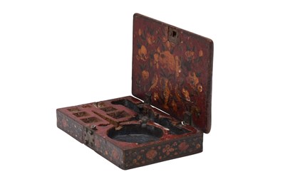 Lot 134 - A MINIATURE QAJAR LACQUERED PAPIER-MÂCHÉ WEIGHING TOOLBOX
