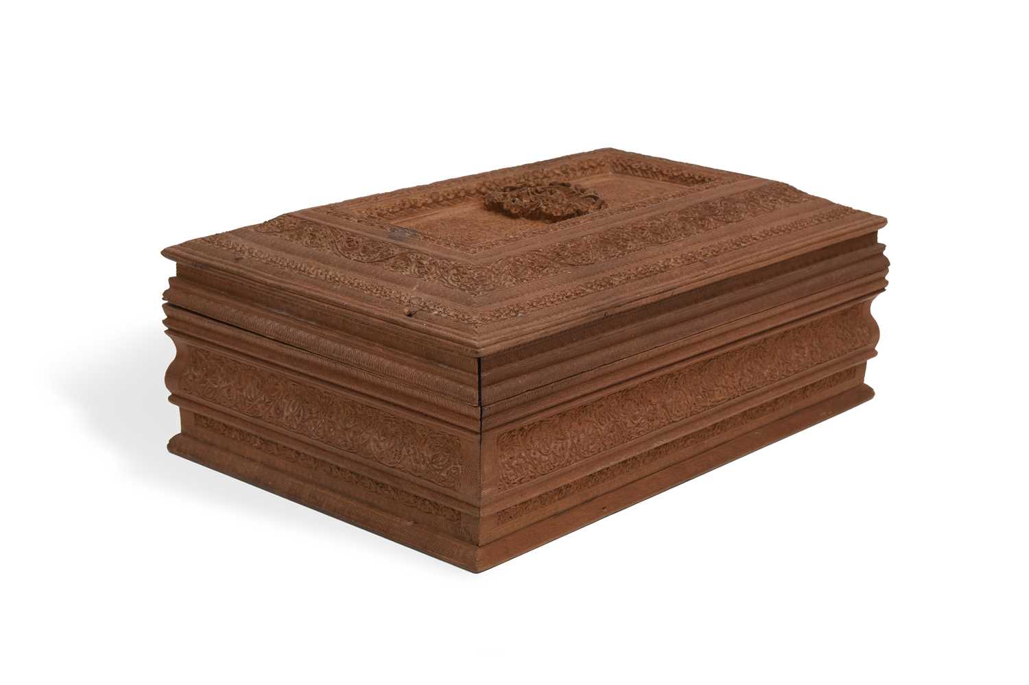 Lot 70 - AN ANGLO-INDIAN CARVED SANDALWOOD LIDDED BOX