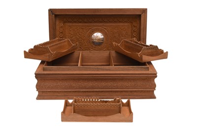 Lot 70 - AN ANGLO-INDIAN CARVED SANDALWOOD LIDDED BOX