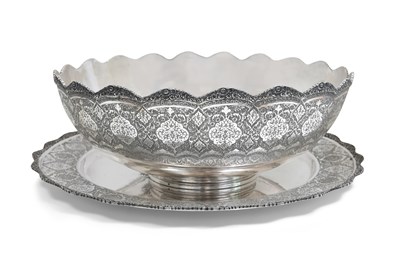 Lot 109 - A LARGE ENGRAVED IRANIAN SILVER BOWL AND TRAY BY MAHMUD RABI'I