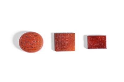 Lot 13 - THREE ENGRAVED CARNELIAN INTAGLIO SEALS