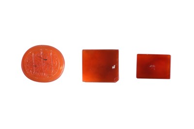 Lot 13 - THREE ENGRAVED CARNELIAN INTAGLIO SEALS